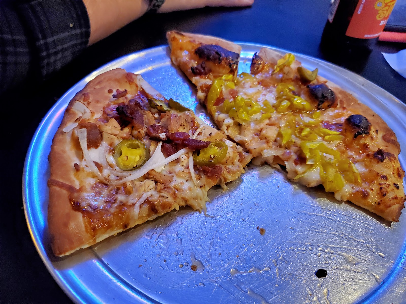Slices of BBQ chicken pizza at Big Papa's Pizza & Sports